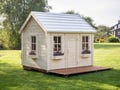 Handcrafted Wooden Playhouse for Kids – Backyard Cottage with Porch product logo