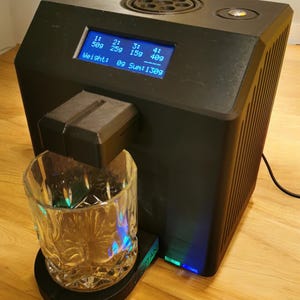 A machine for pouring drinks from four ingredients. Thanks to the built-in scale, the machine will pour as much liquid as you want.