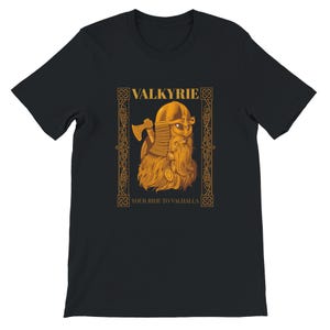 May include: Black t-shirt with a gold illustration of a Viking warrior holding an axe. The design includes the text "VALKYRIE" and "YOUR RIDE TO VALHALLA" in gold, framed by decorative borders. The Viking has a helmet and beard.