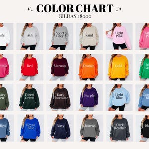 May include: Color chart of Gildan 18000 sweatshirts in various colors, including white, ash, sport grey, sand, light pink, safety pink, red, maroon, orange, gold, and more. The chart displays the available colors for the sweatshirts.