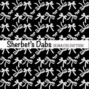 May include: A seamless pattern featuring white bows on a black background. The pattern is repeated throughout the image.
