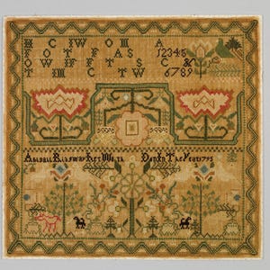 May include: A square needlepoint sampler on tan fabric featuring a dark green zigzag border. It displays black alphabet letters, numbers 123456789, floral motifs in red and green, birds, trees, and the text Abidall Risway Her Work Done In The Year 1795.