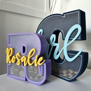 3D-Buchstaben-Spardose mit transparentem Sichtfenster – Personalisiert und individuell gedruckt aus PLA