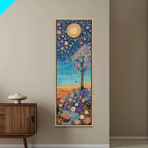 May include: Vertical art print featuring a vibrant landscape with a tree, flowers, and a celestial sky. The artwork showcases a tree with colorful blossoms, a bright sun, and a starry night sky. The painting is framed in a light oak frame.
