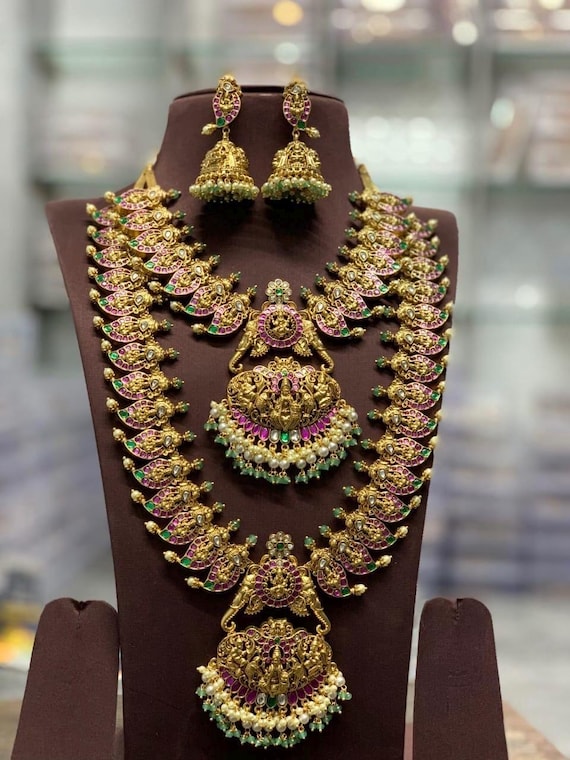 Jadau Kundan Haram Set | South Indian Bridal Necklace Set | Goddess Lakshmi Design | Antique Gold plated n Ruby & Emerald Stones | POSHARO
