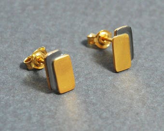 Geometryczne srebrne kolczyki – dwukolorowy wzór w kolorze złotym i czarnym, prostokątny