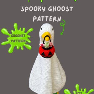 May include: A crochet pattern for a Halloween goose costume. The goose is dressed as a ghost, with a white crocheted body and a pumpkin-shaped candy basket. The text says "Spooky Ghoost Pattern" and "Fits 58-61cm Goose".