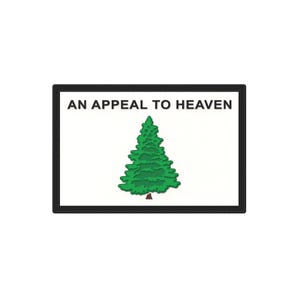 May include: A black and white rectangular patch with the text "AN APPEAL TO HEAVEN" in black lettering. A green pine tree is centered on the patch.