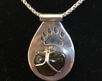 Sterling silver necklace with bear paw and black stone