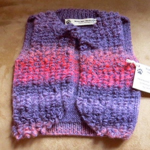 Chic handknit pink and purple faux fur wool baby vest