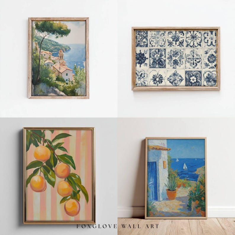 May include: Four framed art prints. Top left: a coastal watercolour scene. Top right: blue and white floral tile design. Bottom left: orange fruit on a branch against pink stripes. Bottom right: coastal scene with a blue door and ocean view.