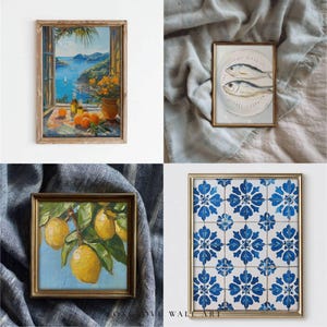 May include: Four framed art prints. Top left: a coastal landscape painting with oranges and a bottle. Top right: a still life of two fish on a plate. Bottom left: a lemon tree painting. Bottom right: a blue and white tile pattern.