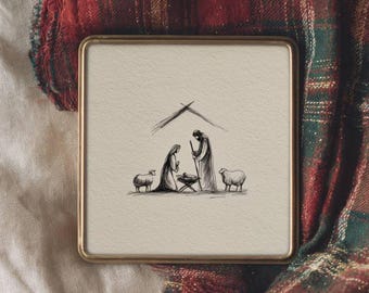 May include: A framed, square artwork with a gold border. The artwork features a black and white sketch of a nativity scene, including Mary, Joseph, the baby Jesus, and two sheep. The artwork is set against a cream-colored background.