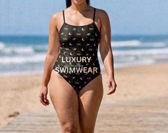 Net Worth One-Piece Swimsuit | Black Gold Luxury Monogram, Moon & Jet Print, Resort Wear
