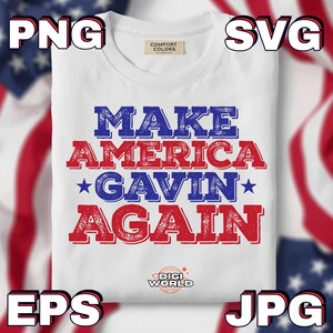 May include: White t-shirt with the text "MAKE AMERICA GAVIN AGAIN" in blue and red distressed lettering. The shirt includes a blue star and the Digi World logo. The shirt is folded and ready to wear.
