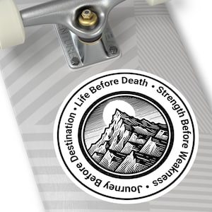 Puede incluir: Pegatina en blanco y negro con una ilustración de una cordillera y el texto "Journey Before Destiny. Life Before Death. Strength Before Weakness."