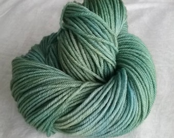 Tide Pool (PRE-ORDER), green-blue tonal hand-dyed superwash merino worsted wool yarn.