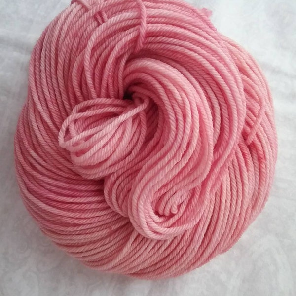 Coral Blush (PRE-ORDER), a warm peachy-pink tonal, hand dyed yarn, worsted, indie dyer