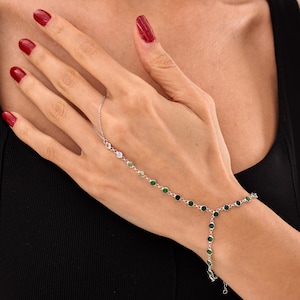 May include: A set of three ceramic mugs with a speckled, matte finish. The mugs are in shades of cream, light gray, and dark gray. Each mug has a simple, minimalist design, perfect for coffee or tea.