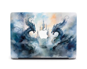 May include: A laptop skin with a watercolor design of two dragons flying over a castle in the clouds. The dragons are blue and gray, and the castle is white with a gray roof. The background is a light blue and gray watercolor wash.