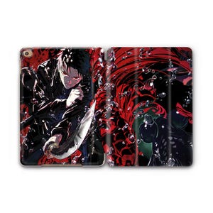 May include: A black and red tablet case featuring a manga-style illustration. The artwork depicts a character with black hair and red eyes holding a sword, set against a backdrop of red and black abstract shapes and bubbles.