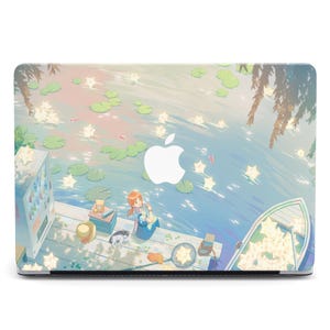 May include: Laptop skin featuring an anime-style illustration of a serene waterscape. A girl sits on a wooden dock with a cat, surrounded by lily pads and glowing stars. A vending machine and a boat are also visible.