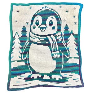May include: A rectangular crochet blanket featuring a central penguin graphic wearing a scarf. The design incorporates a winter forest background with pine trees and snowflakes, rendered in variegated shades of teal, purple, and white yarn.