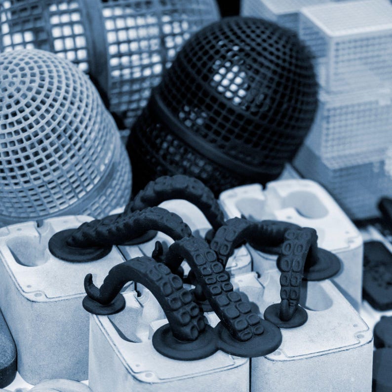 “Professional 3D design station showing dual monitors with custom mechanical component models, advanced 3D sculpting, photorealistic rendering, and precision modeling workflow, perfect for Etsy sellers, digital portfolios, VR/AR projects, and engineers, high-detail polygon modeling, realistic textures and lighting, optimized for Google and Etsy SEO, professional custom 3D asset creation and visualization.”