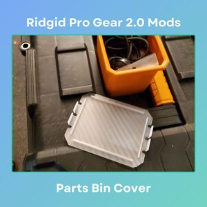 May include: A white plastic cover for a Ridgid Pro Gear 2.0 parts bin. The cover has a textured surface and fits over the top of the bin.