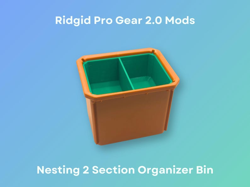 May include: A two-section organiser bin for the Ridgid Pro Gear 2.0 system. The bin is orange with a green interior and is designed to nest with other bins.