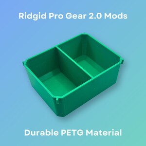 May include: A green plastic storage container with two compartments. The container is designed to fit into the Ridgid Pro Gear 2.0 tool box. The container is made of durable PETG material.