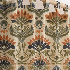 May include: Curtains with a repeating floral pattern in shades of orange, blue, green, and beige. The design features stylized flowers and leaves. The curtains are hanging from a wooden rod.