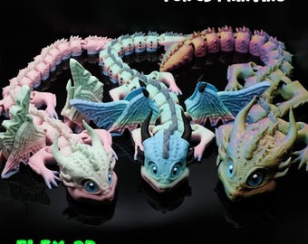 May include: A collection of colorful 3D-printed dragon figures. The dragons feature articulated bodies and wings, with a variety of pastel colors including pink, blue, and green. The text "DIGITAL DOWNLOAD FOR 3D PRINTING" is visible.