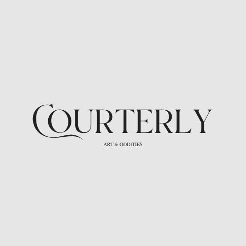 May include: Black and white logo for a business called "Courterly" with the tagline "Art & Oddities".