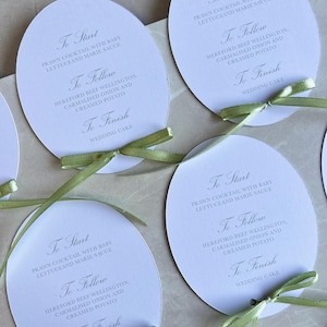 Menù con fiocco ovale, menù sagomati, menù per matrimoni, menù per eventi, menù con fiocco, menù a nastro per matrimoni, menù ovali per matrimoni, menù ovali per eventi,