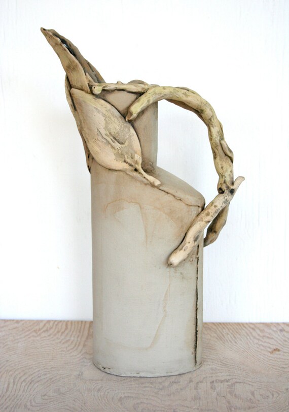 Sculptural earthenware pitcher with leaves and twigs Etsy