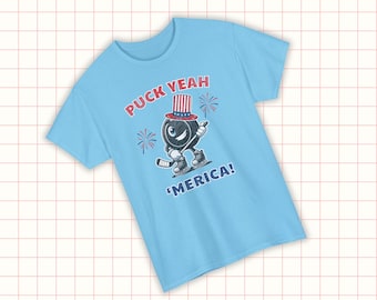 Patriotic Hockey Shirt – Funny “Puck Yeah America” Tee – USA Red White & Blue Graphic Shirt for Hockey Fans or Players