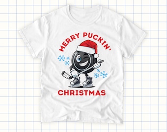 Christmas Hockey T-Shirt for Adults – Funny Holiday Hockey Shirt – Hockey Mom or Dad Gift – Merry Puckin' Christmas Puck With Santa Hat