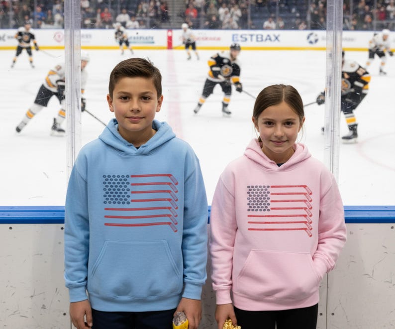 Kids Patriotic Hockey Hoodie With Hockey Sticks and Hockey Pucks in the Shape of the American Flag