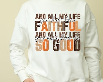 May include: White sweatshirt with a brown, orange, and white graphic print that reads "And all my life you have been faithful and all my life you have been so so good".