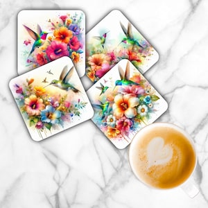 May include: A set of four square coasters featuring vibrant watercolor illustrations of hummingbirds and tropical flowers in shades of pink, orange, blue, and green. Each coaster displays a unique arrangement of birds and blossoms.