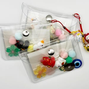 Estuche transparente para tarjetas y monedas Lucky Pack