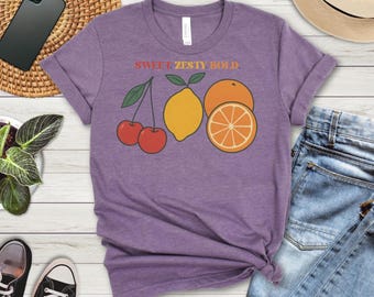 サンキッスドオレンジのグラフィックTシャツ、フレッシュで爽やかな