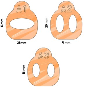 May include: Three orange-colored, abstract shapes labeled A1, A2, and A3. A1 is 13mm high and 28mm wide, with a large oval cutout. A2 is 20mm high and 9mm wide, with two oval cutouts. A3 is 16mm high and 8mm wide, with two oval cutouts.