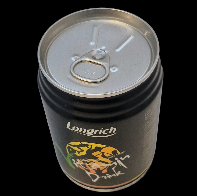 May include: A black Longrich drink can with a silver top and pull tab. The can features a colorful graphic with the words "Black Ginger Drink". The can is set against a black background.