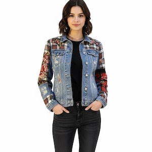 May include: A light-wash denim jacket with plaid and floral embroidered details. The jacket has a classic collar, button-down front, and distressed elements. The sleeves feature a mix of plaid and floral patterns, adding a unique touch to the outerwear.
