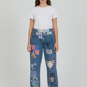 Jeans in denim patchwork riciclato: Levi 569, coulisse in vita