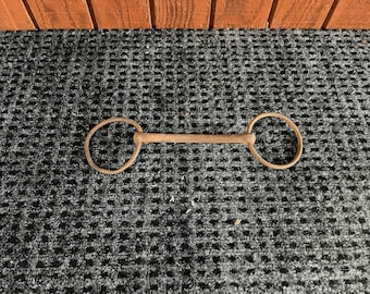 Antique genuine horse bridle bit. Rustic vintage patina for Western farmhouse decor.