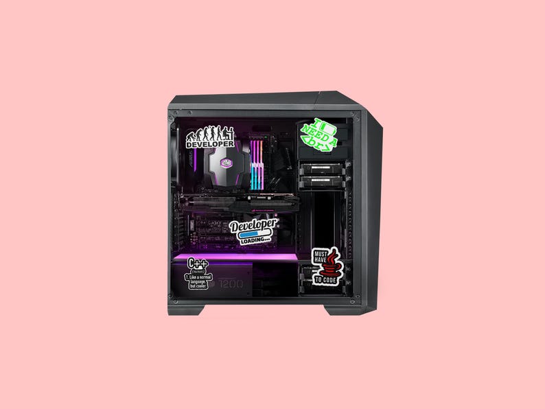 May include: A black computer case with a glass side panel, revealing colourful internal components and a motherboard with a sticker that says "Developer Loading..." There are several other stickers on the case, including "I Need a Coder", "Must Have to Code", and "C++ Like a Normal Person".