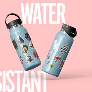 May include: Two light blue water bottles with black lids and handles, adorned with various stickers. The word "WATER" is displayed in white above the bottles, and "RESISTANT" is below, against a pink background.